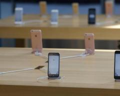 武汉苹果维修电话_苹果减少对高通的专利使用费